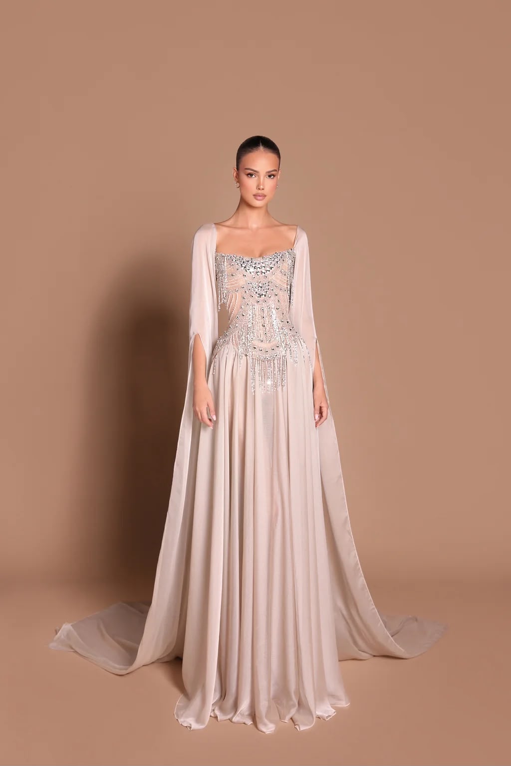 Crystal-embellished cape gown