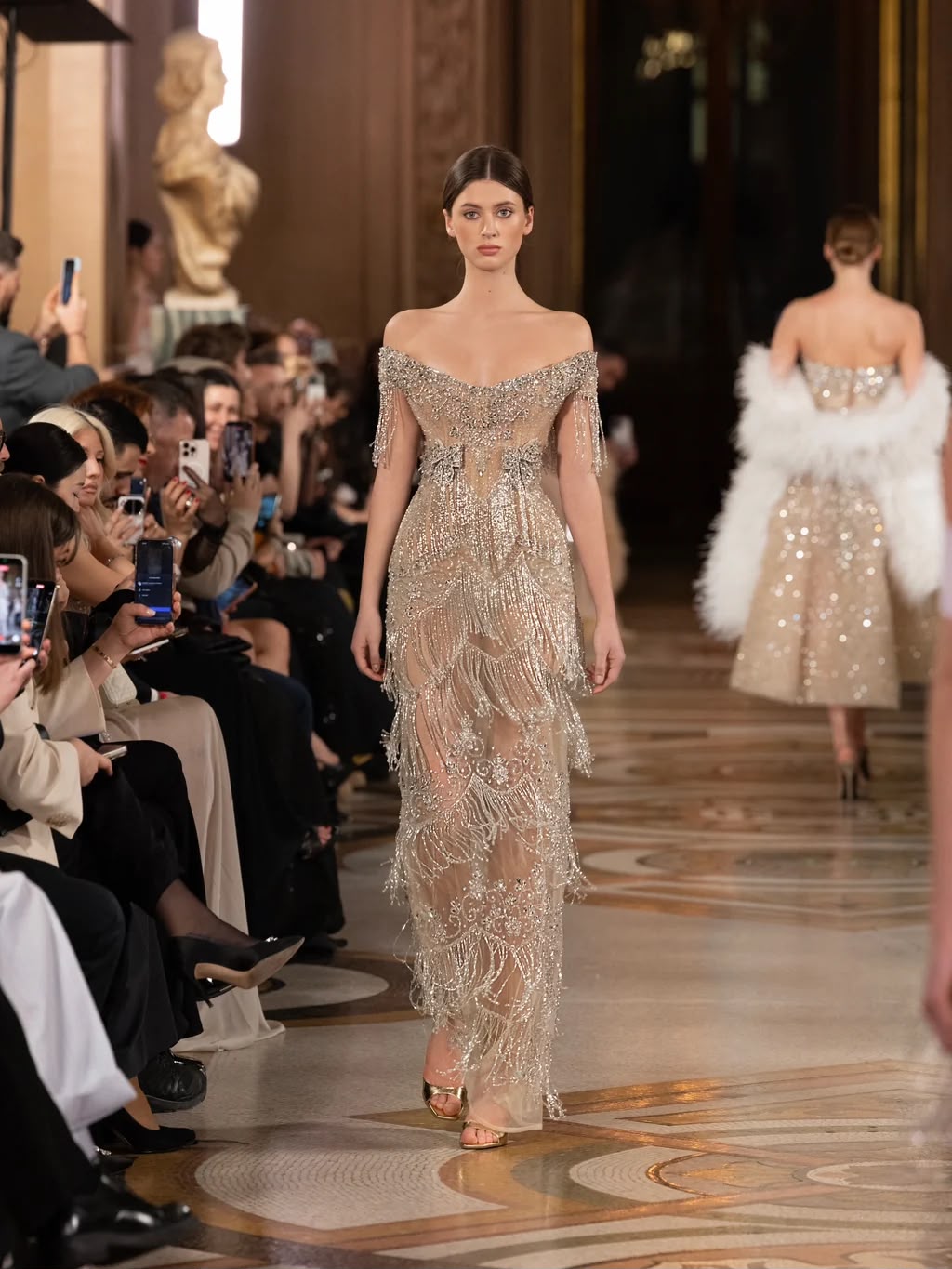 Beaded fringe corset gown on the runway